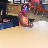 21st Street KinderCare Photo - She is practicing writing her name.