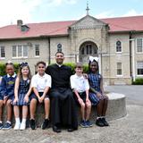 Sacred Heart of Jesus School Photo - Fr. Josh Johnson with Sacred Heart of Jesus School students.