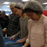 St. Paul Preparatory School Photo - SPP seniors have a service learning requirement to fulfill for graduation. Here they are volunteering at Feed My Starving Children.