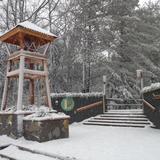 The Leelanau School Photo - The Senior Bell at the front of the Student Center welcomes students