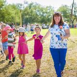 Tucson Waldorf School Photo - First Grade Students are welcomed each year with a Rose Ceremony, welcoming the newest class from the Playgarden to the Grades!