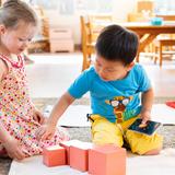 Wilmington Montessori School Photo - Primary (3- to 6-year-old) Program - Preschool and Kindergarten - Students work together to create the Montessori Pink Tower.